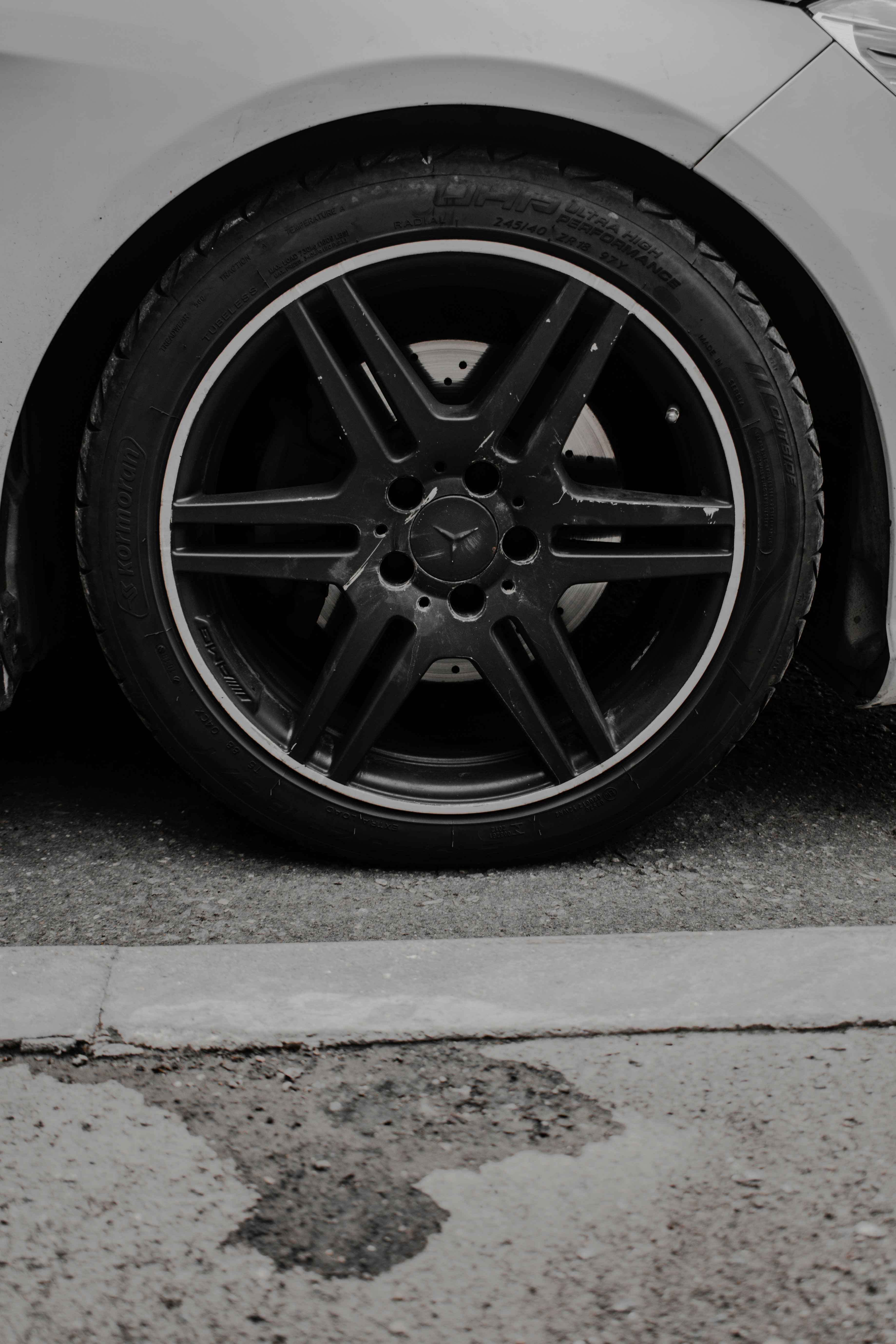 black 5 spoke wheel with tire